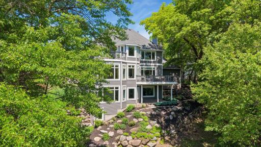 Enjoy breathtaking lake views from all three levels, with a hidden workshop tucked below for projects, storage, or hobbies.