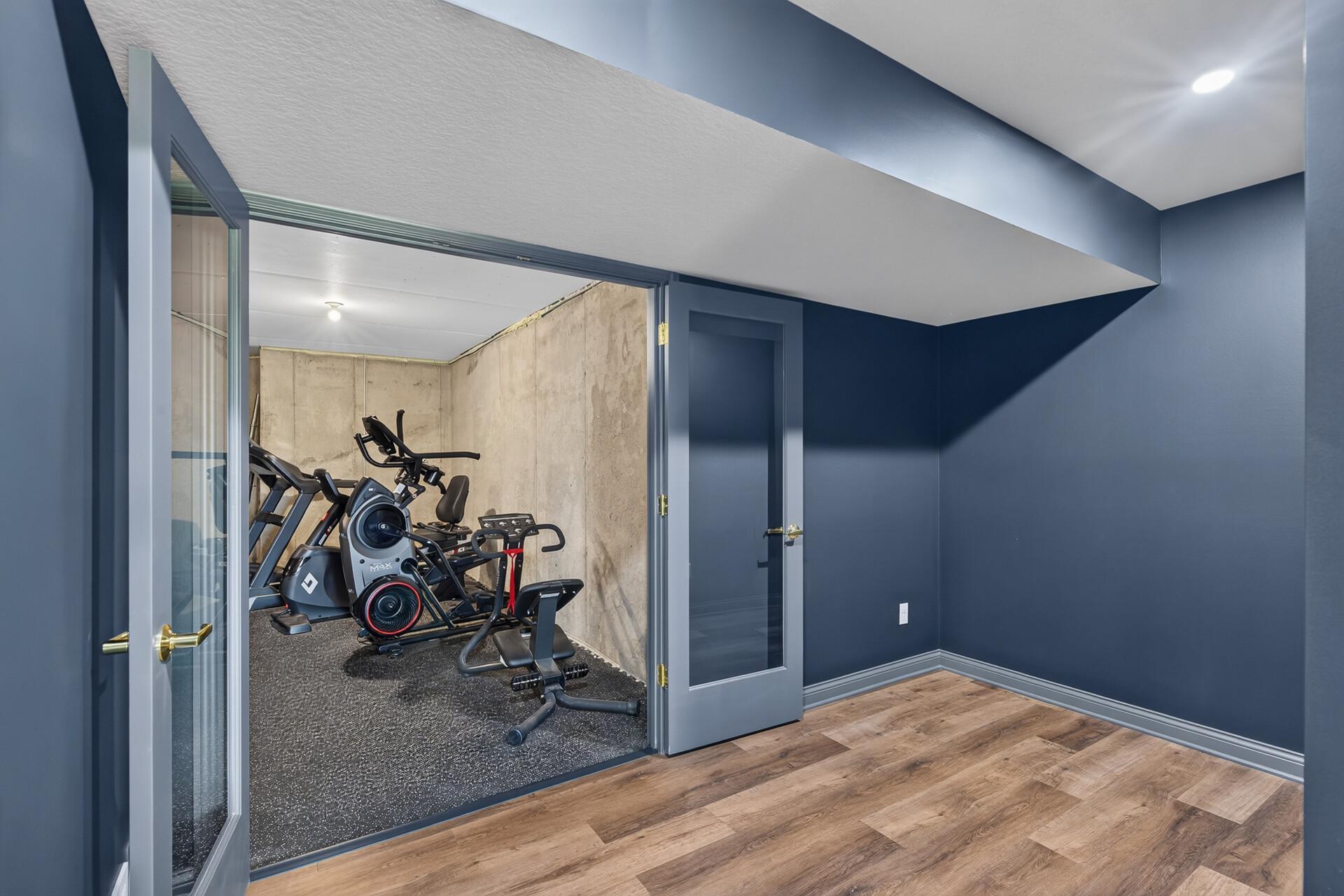 French doors lead to the gym
