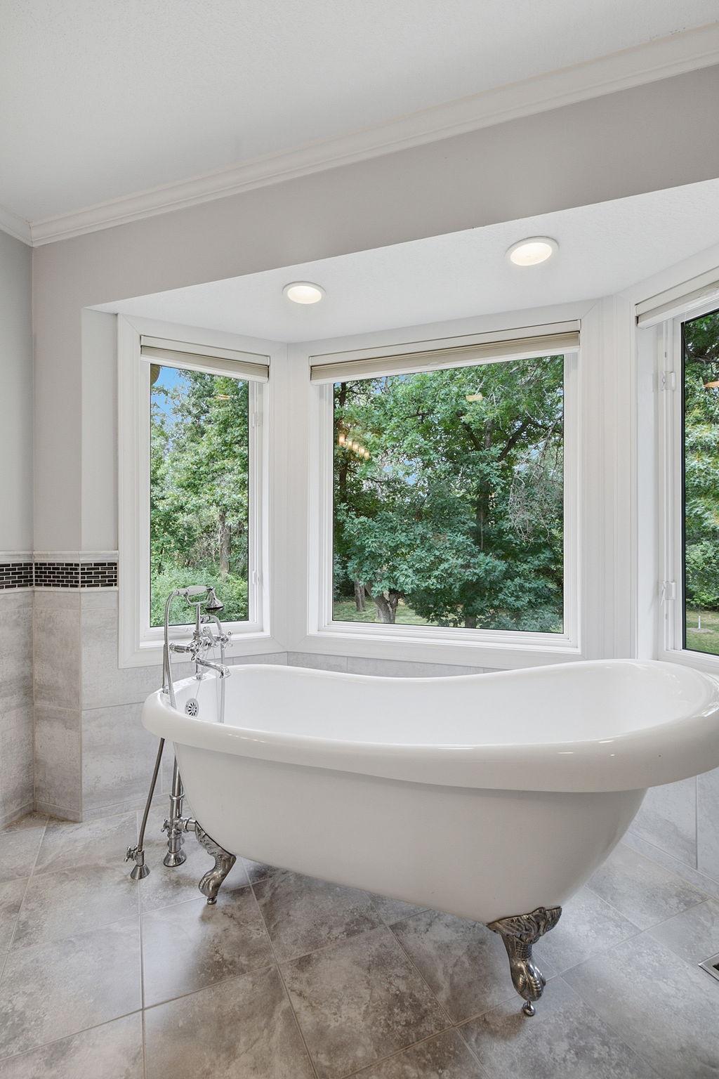 Enjoy a spa-like experience every day in this thoughtfully updated ensuite.