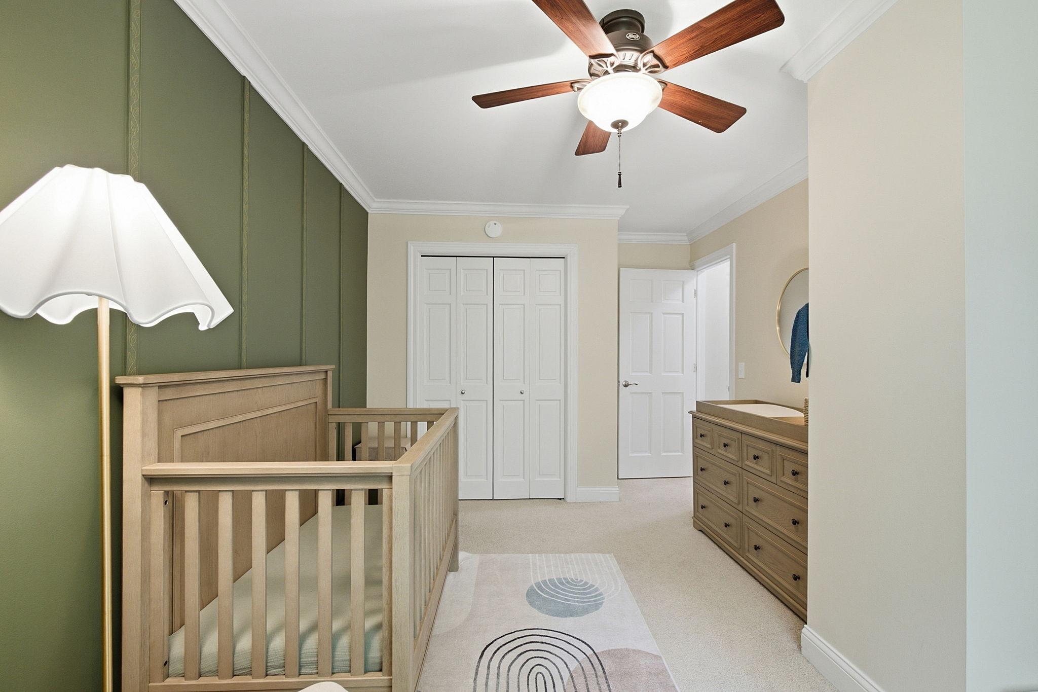 One of four spacious bedrooms conveniently located on the upper level.