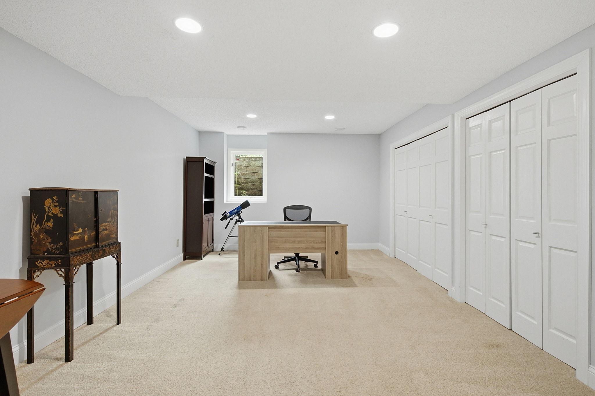 Private fifth bedroom is perfect for guests, multigenerational living, or a home office.