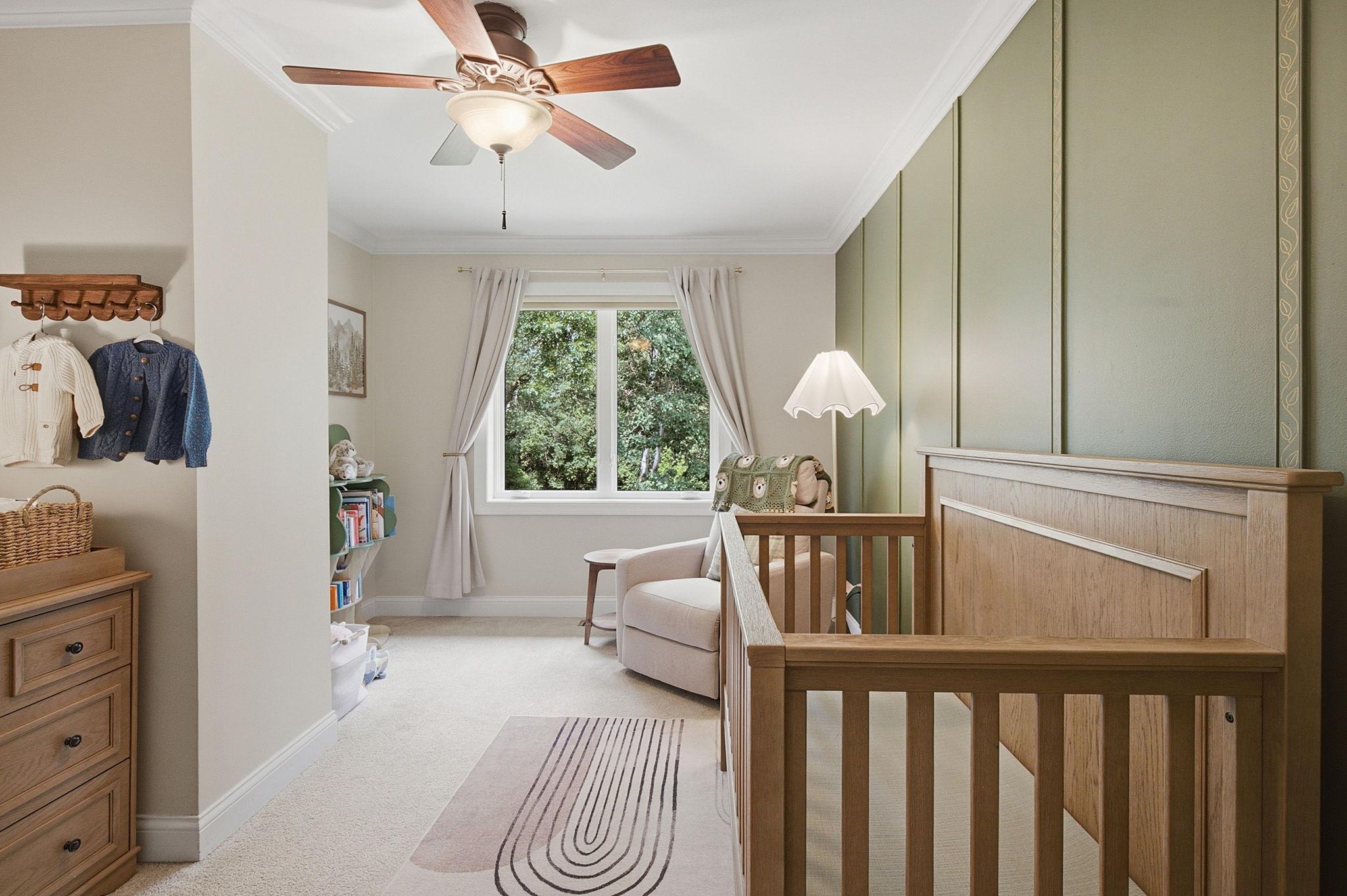 One of four spacious bedrooms conveniently located on the upper level.