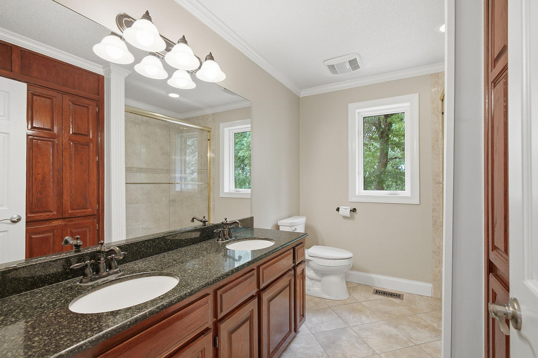 Updated full bathroom with the added comfort of heated floors.