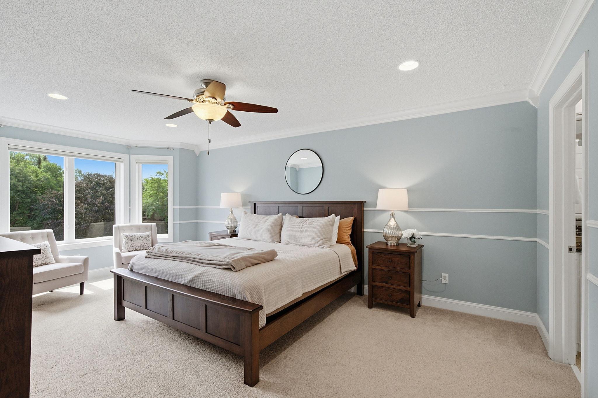 Spacious primary suite designed for comfort and relaxation.