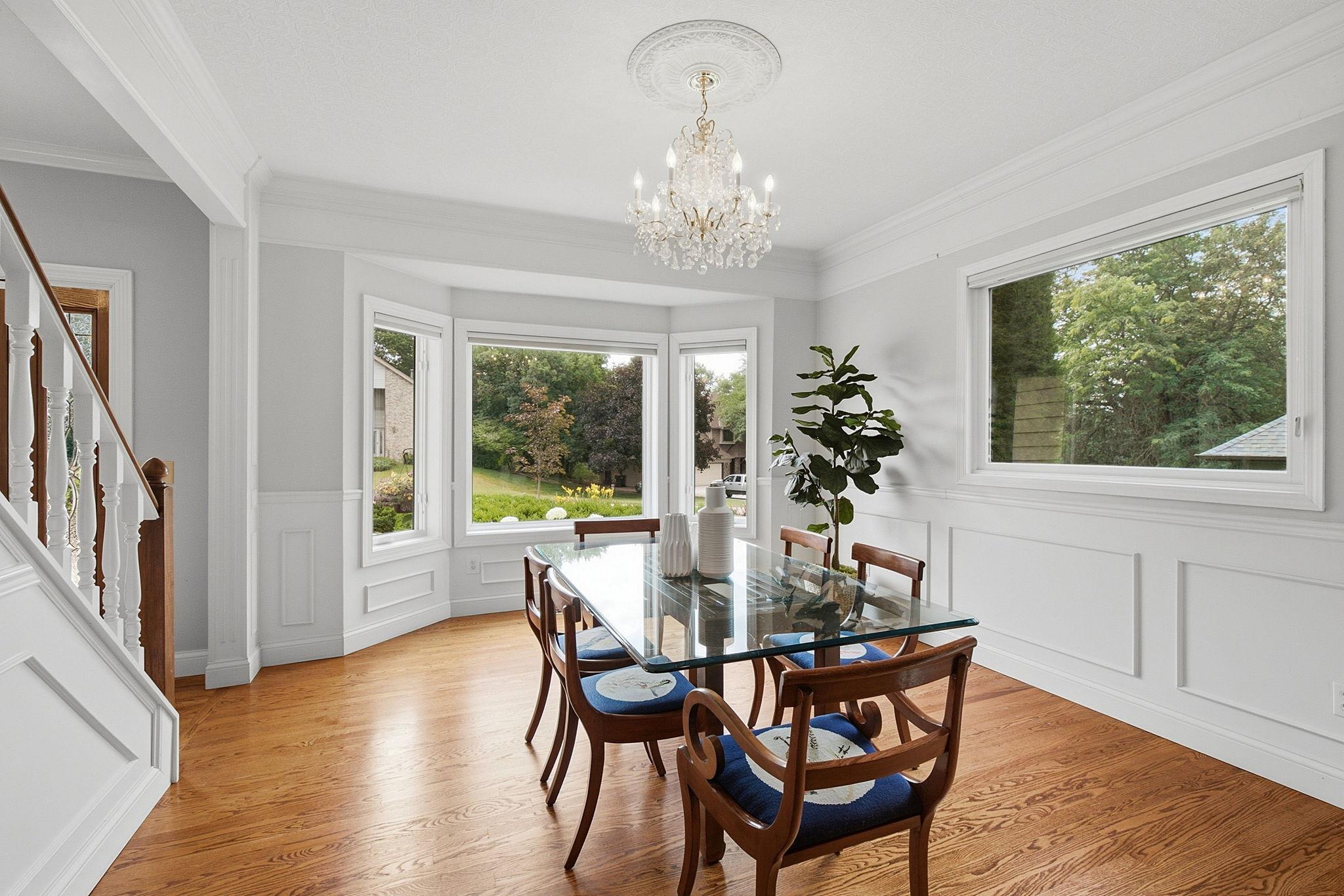 Bright dining room with hardwood floors and seamless flow to the main living areas.