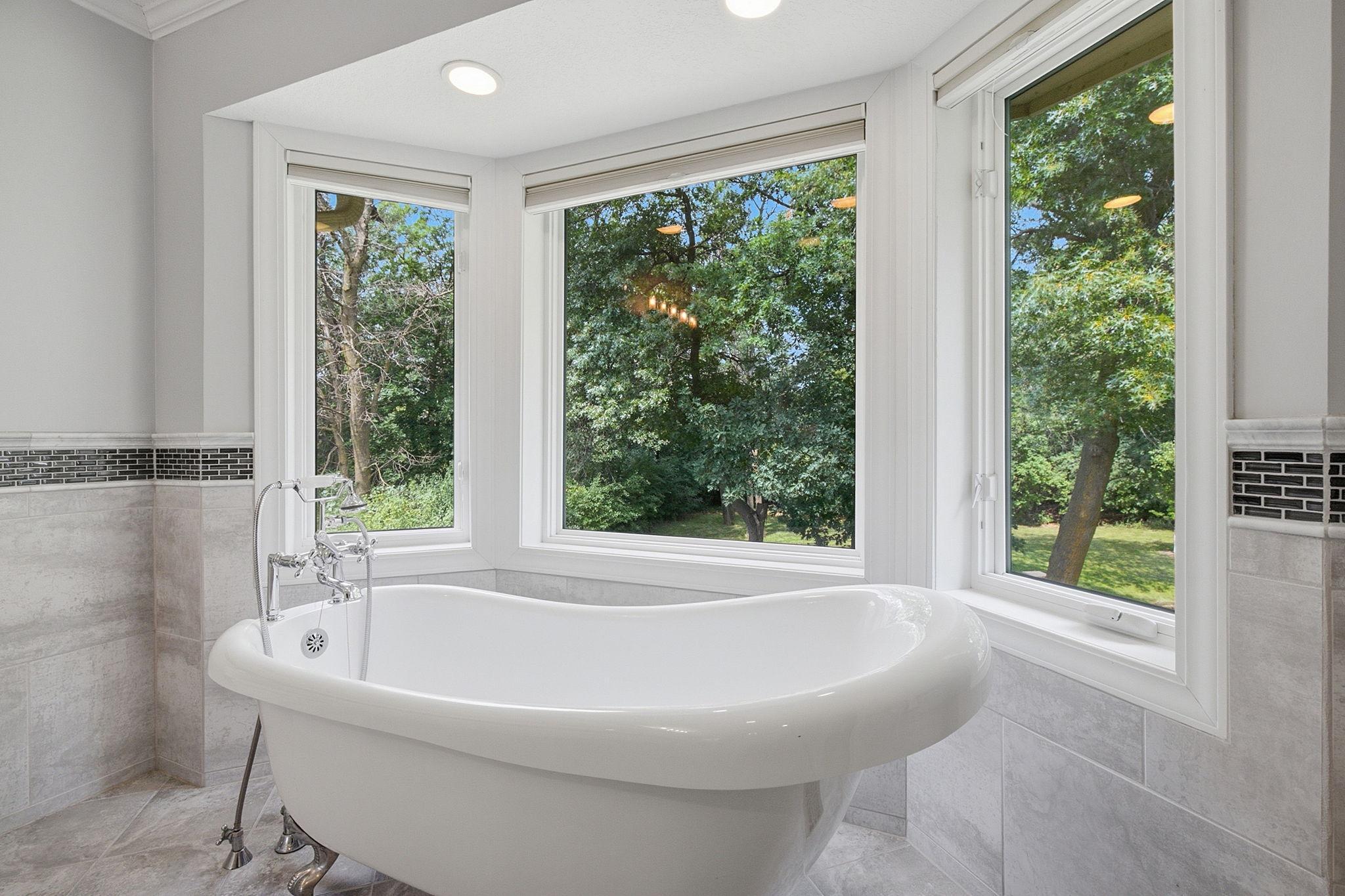Luxury primary bathroom designed with comfort in mind—including heated tile floors.