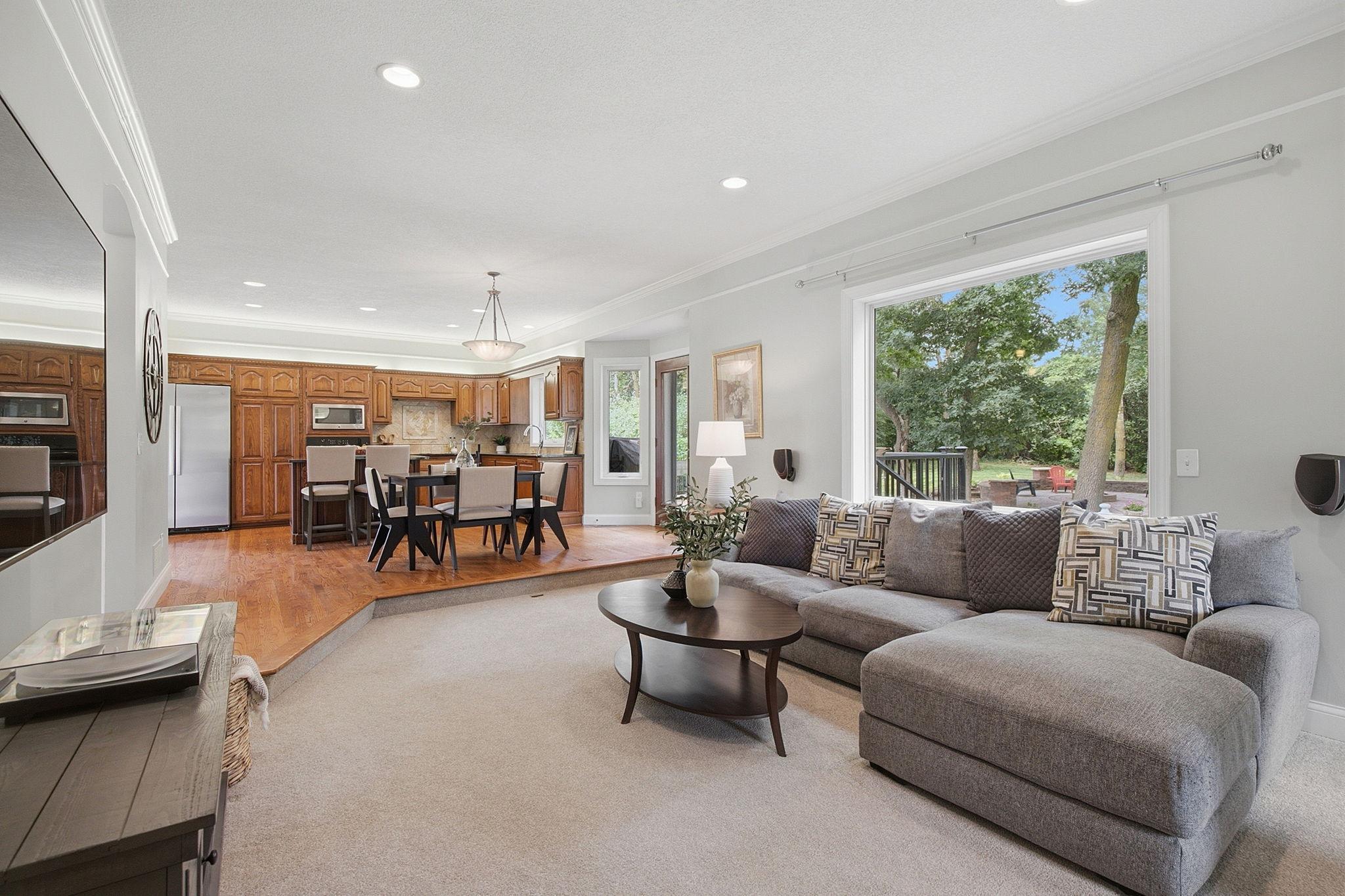 Spacious family room seamlessly connects to the kitchen for effortless entertaining