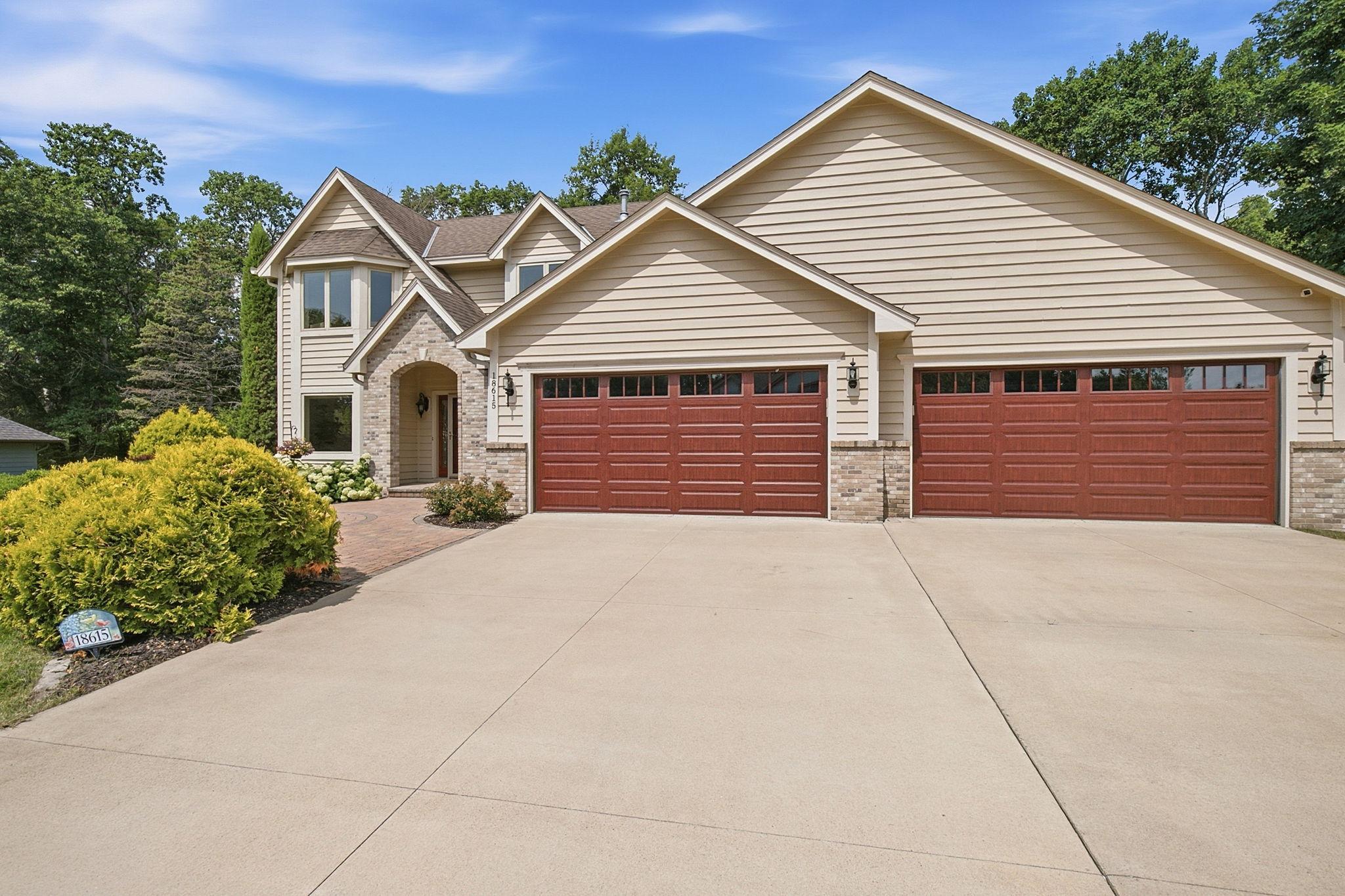 Exceptional 4-car garage provides space for vehicles, tools, toys, and more.