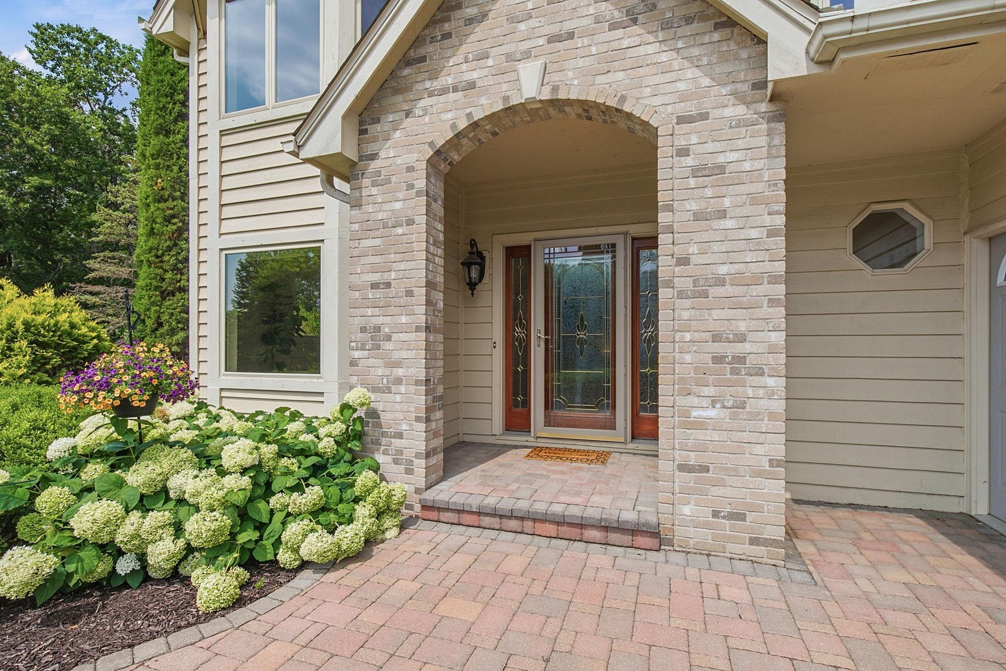 Inviting front entrance welcomes you into this thoughtfully updated Lakeville home.