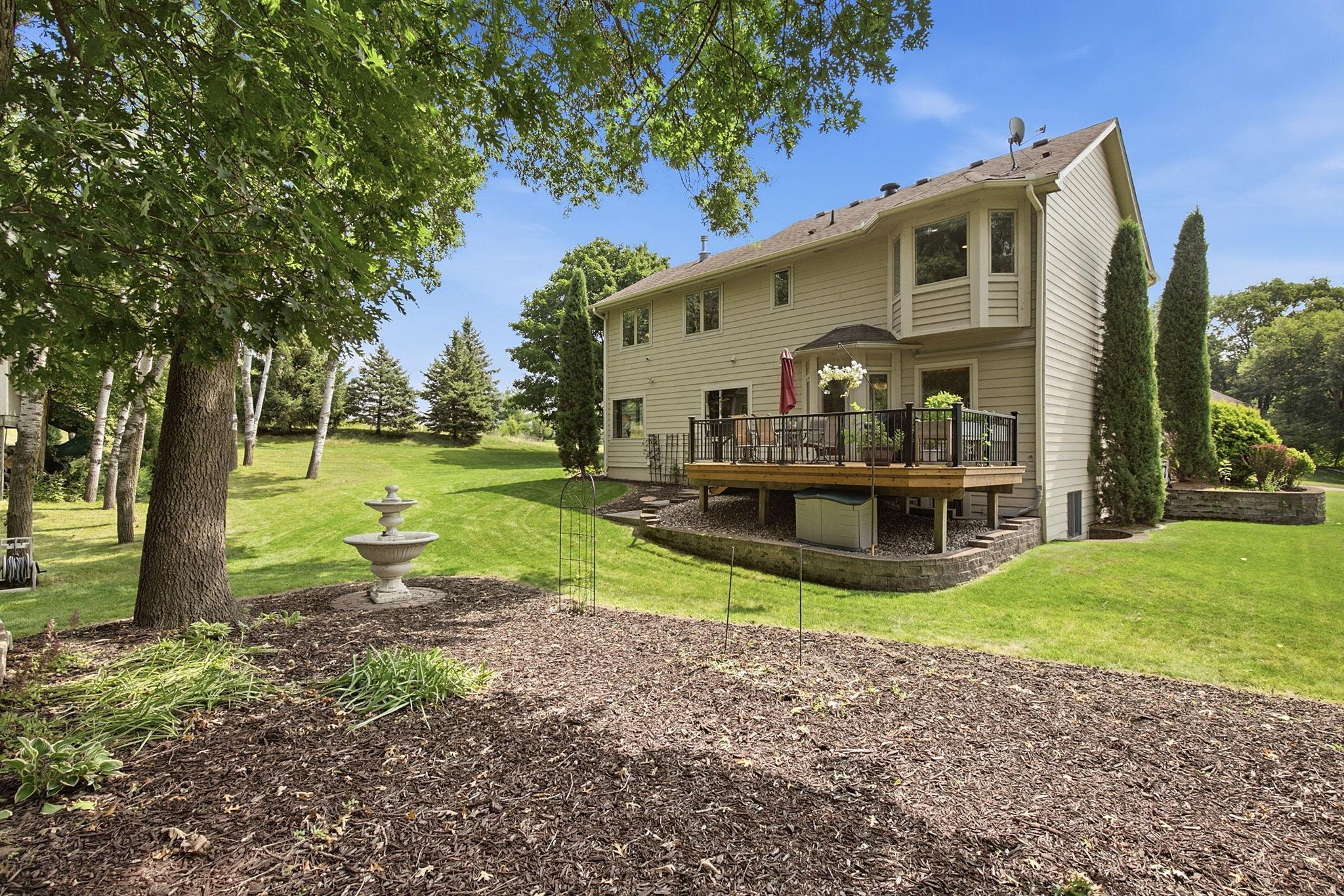 Beautifully landscaped yard with an in-ground sprinkler system.