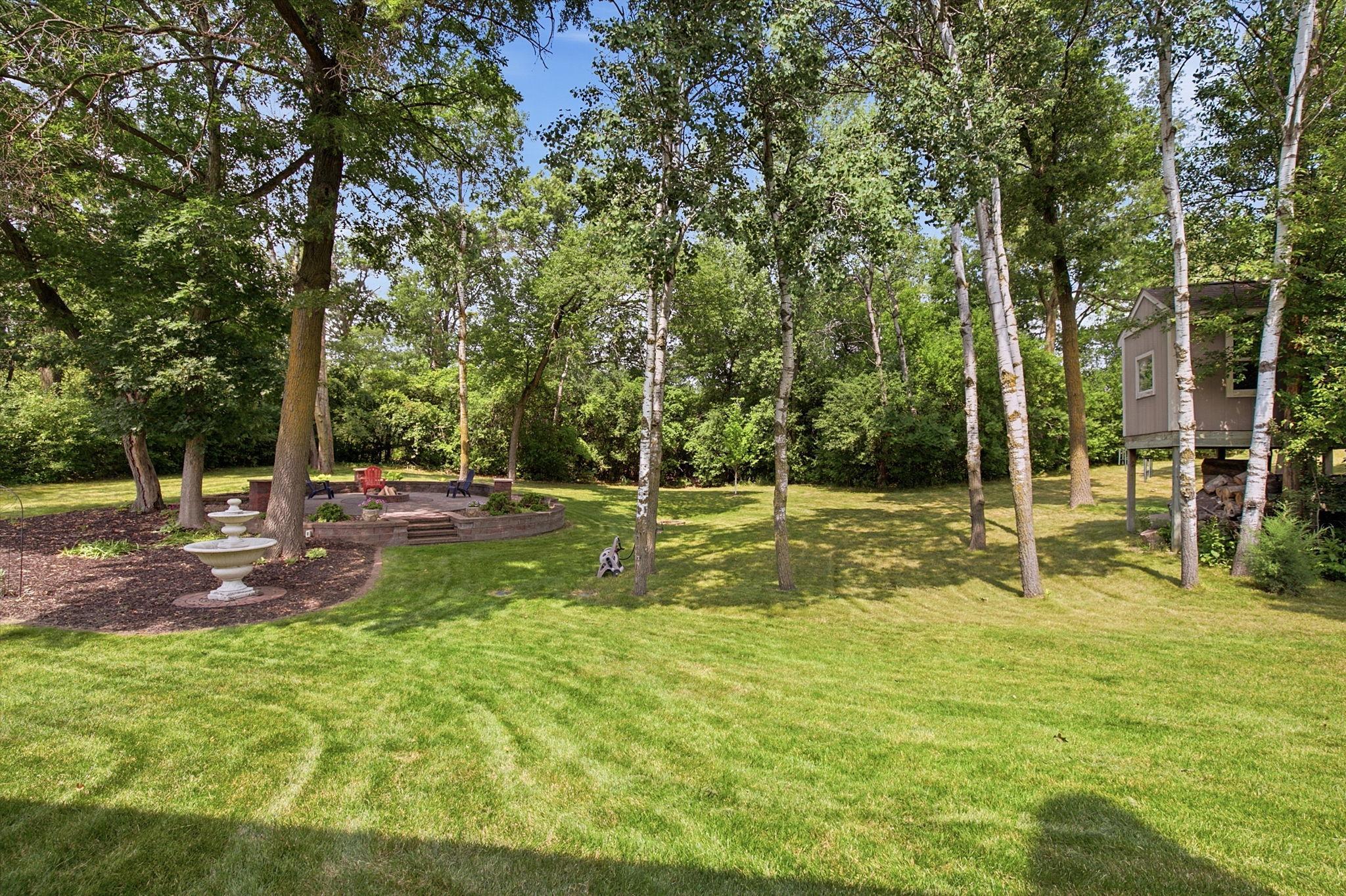 Expansive outdoor living spaces offer room to gather, grill, and unwind.