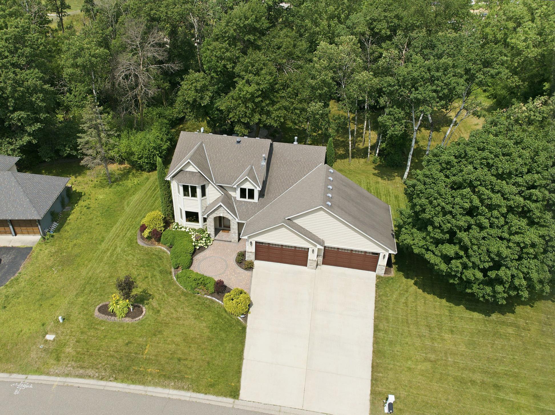 Meticulously maintained with outstanding curb appeal and mature landscaping.