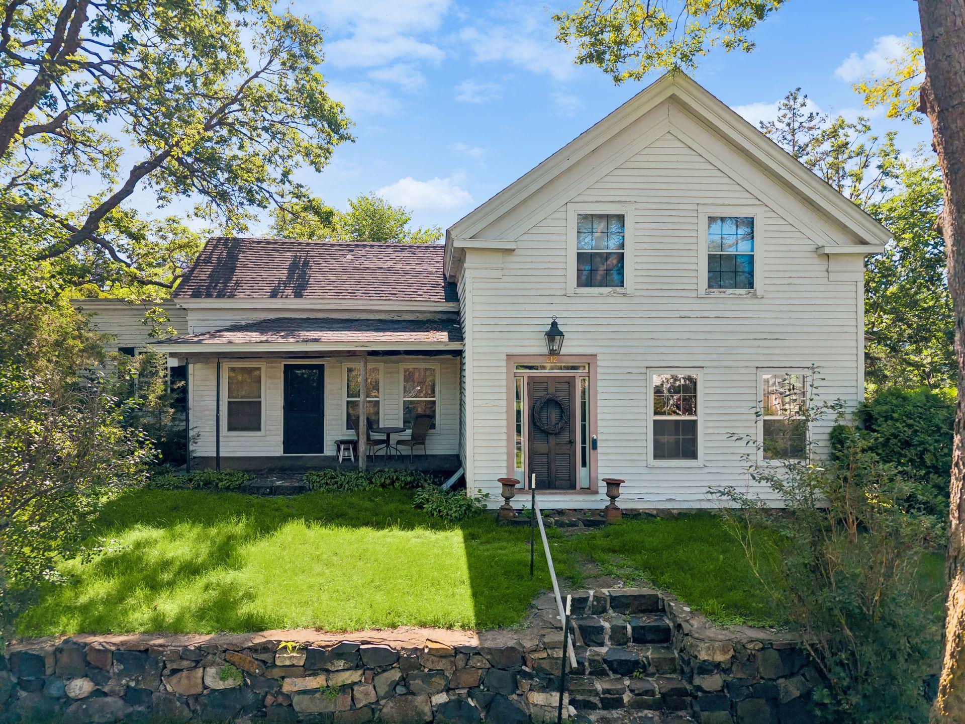 Welcome to 212 Basil Street - This 1860 built Greek to Rival is perched above the river town of Taylors Falls