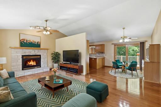 Virtually staged living room and dining area.