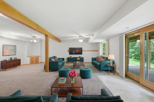 Virtually staged walk-out level family room.