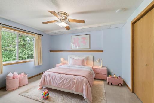 Staged walk-out level bedroom.