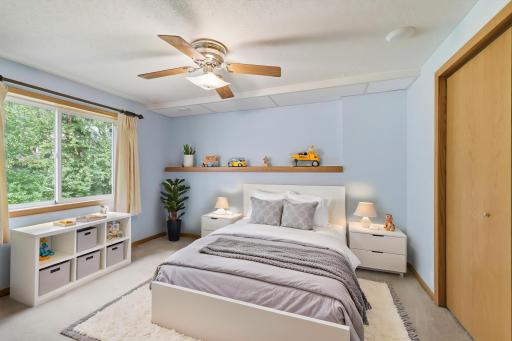 Staged walk-out level bedroom.