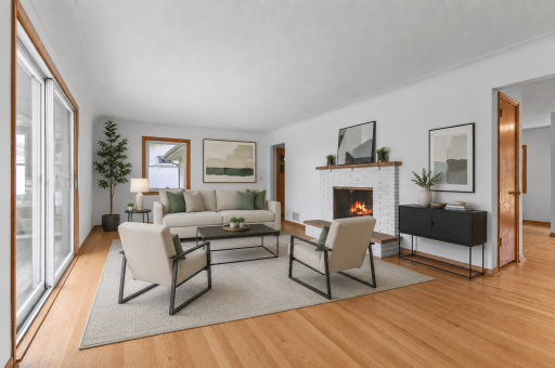 The living room offers original natural hardwood floors that have just been refinished! Professional paint continues to offer a move in ready space. This room is VS