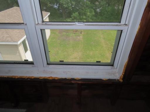 320 vinyl window in attic area.jpg