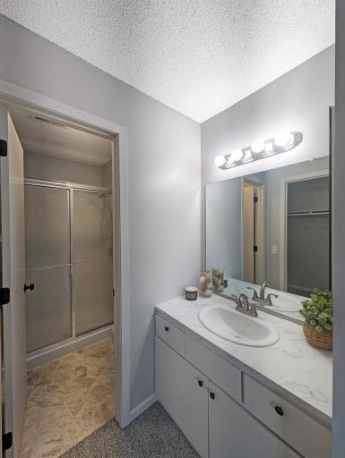 Vanity is outside the shower/toilet room for additional flexibility!