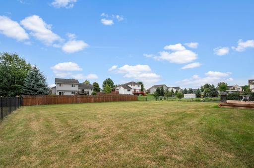 Great level backyard space offering vast open lawn area for outdoor activities