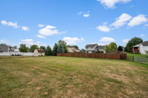 Great level backyard space offering vast open lawn area for outdoor activities