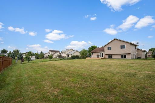 Great level backyard space offering vast open lawn area for outdoor activities.