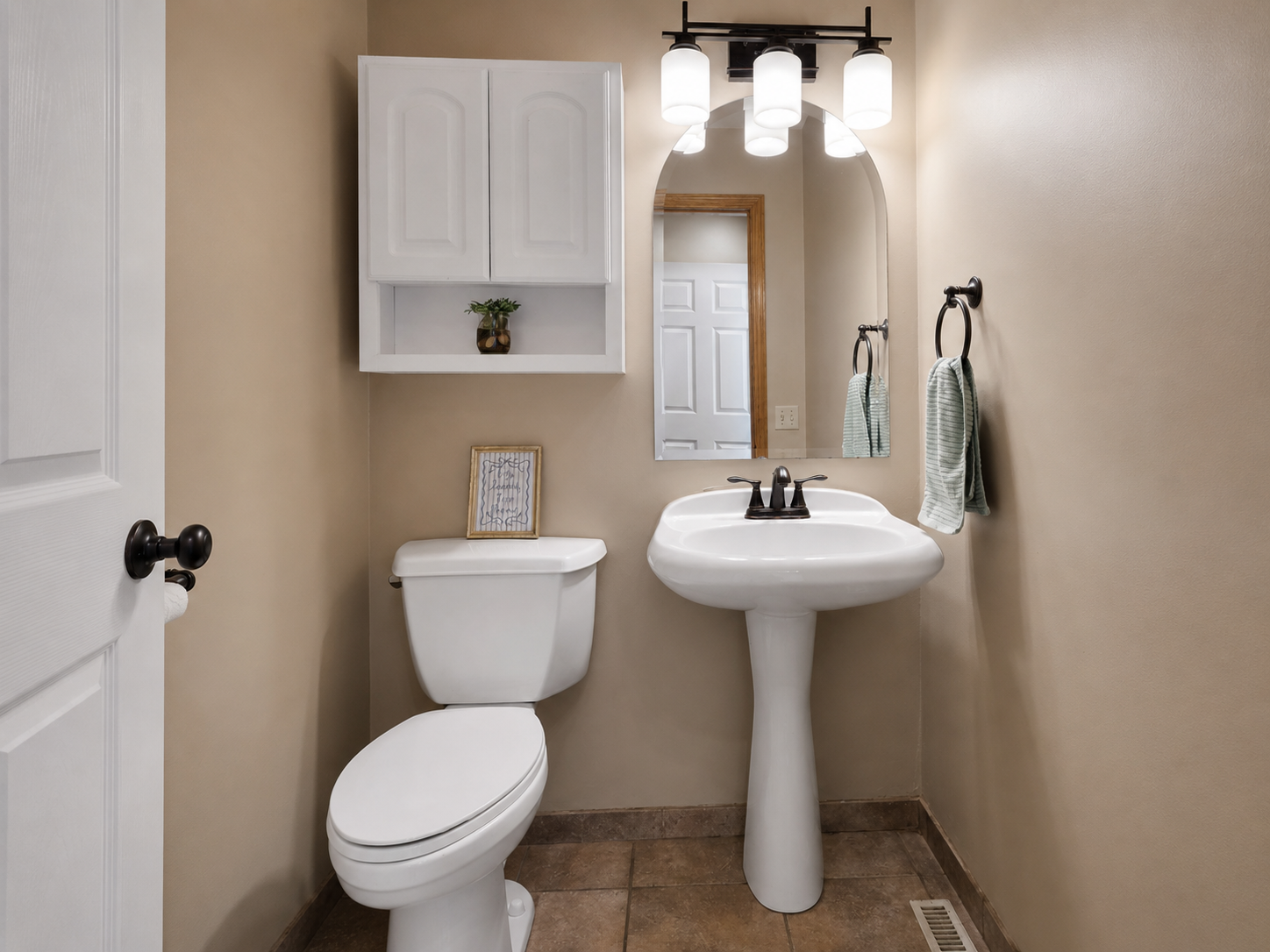 Half Bath off of Kitchen Main Level
