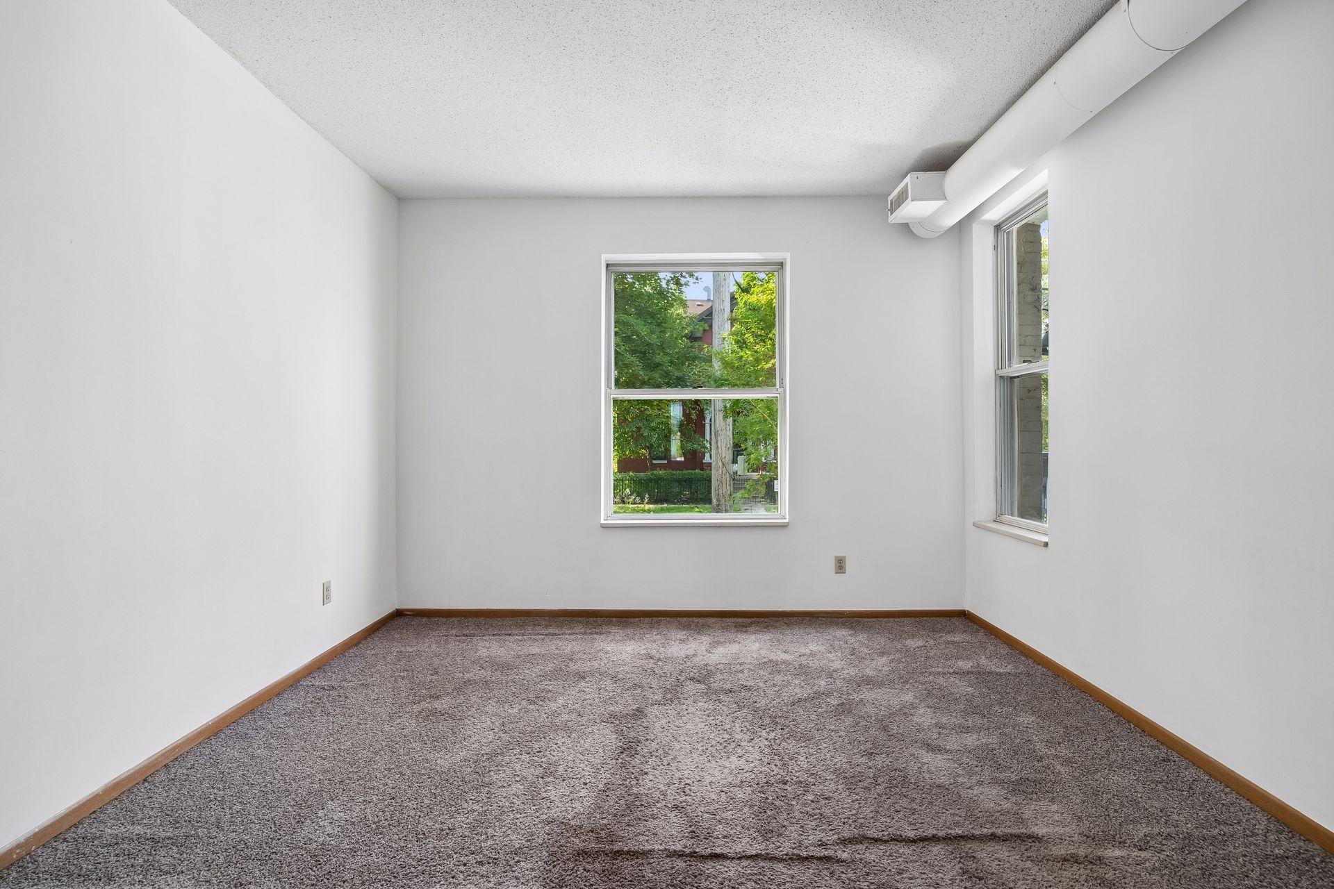 Enjoy the bright living room overlooking the front.