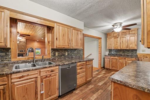 Remodel included new cabinets, countertops, & flooring.