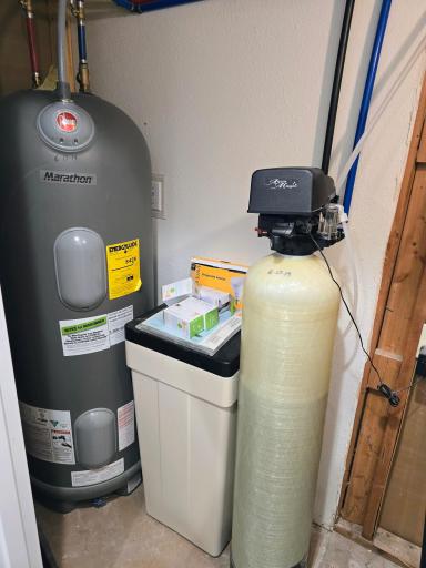 Water heater, water softerner located in hallway utility closet