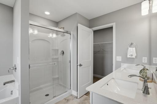 Primary En-Suite with a Dual Vanity and Large Walk In