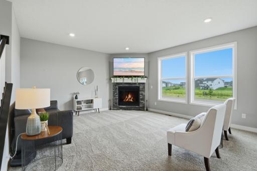 Bright and Sunny Living Room with Pond Views
