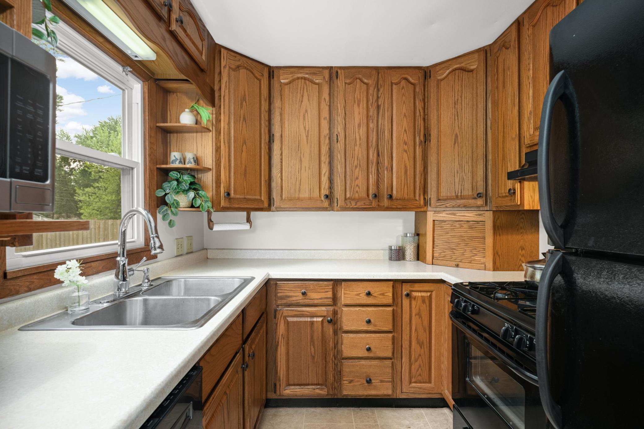 There is loads of cabinetry in the kitchen.