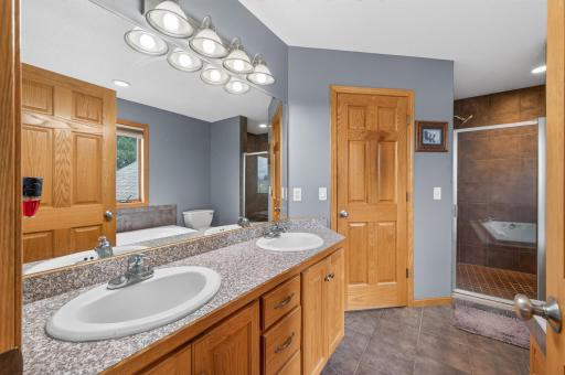 double sinks in primary bath and big ceramic shower