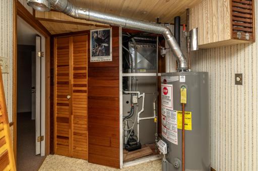 Mechanical Room with High Efficiency Furnace and Updated Water Heater