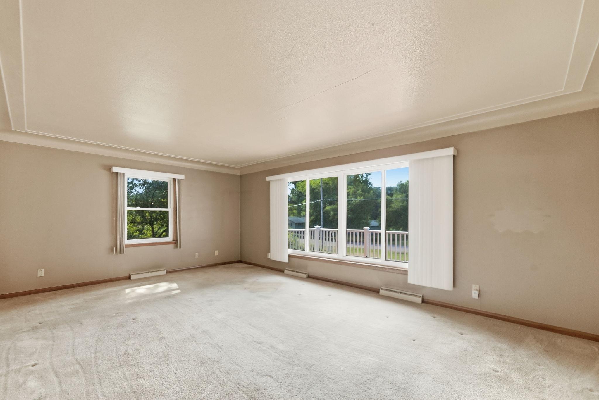 Window looks out to front deck.