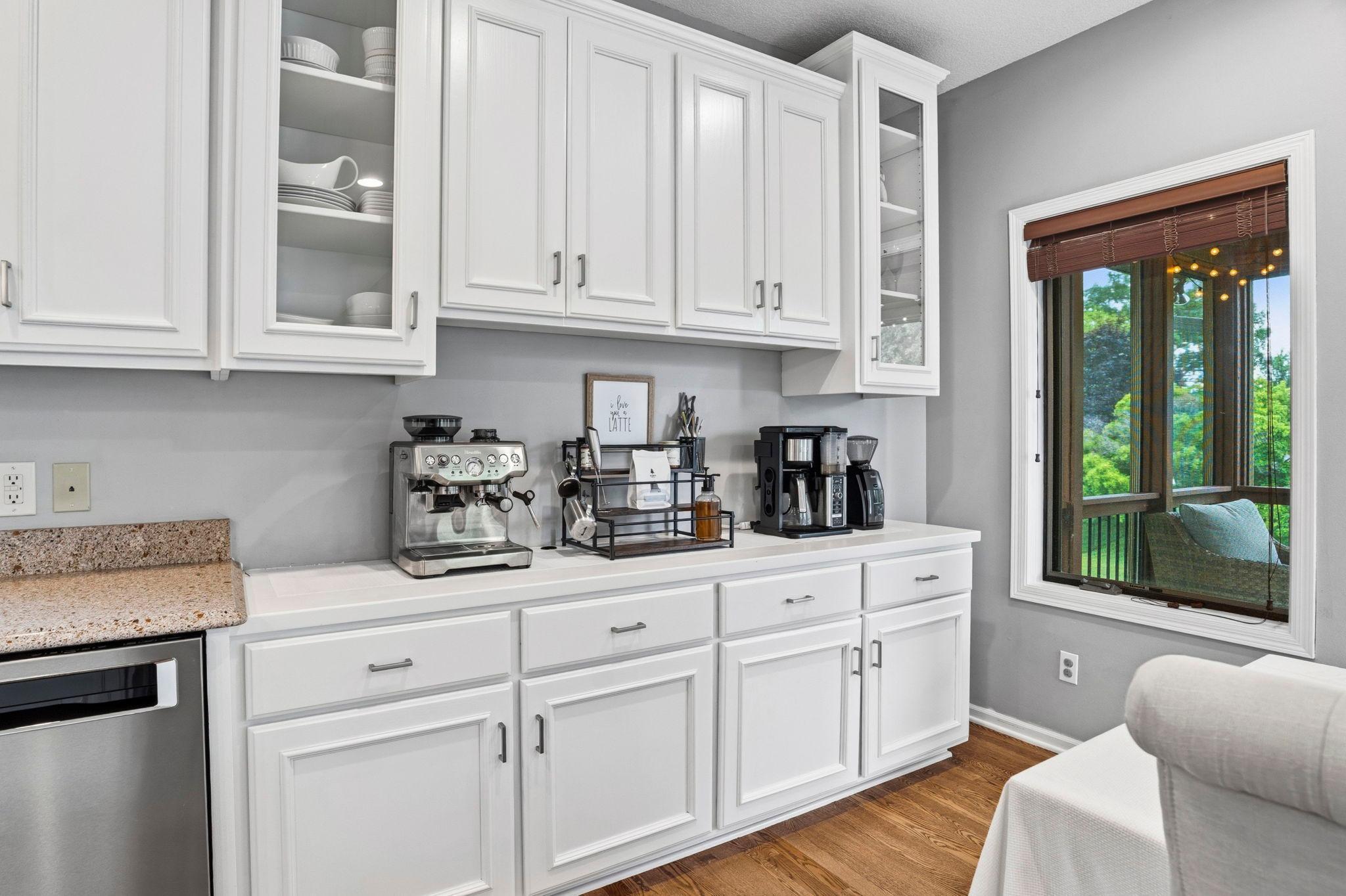 A seven-foot coffee/serving bar with display cabinets.