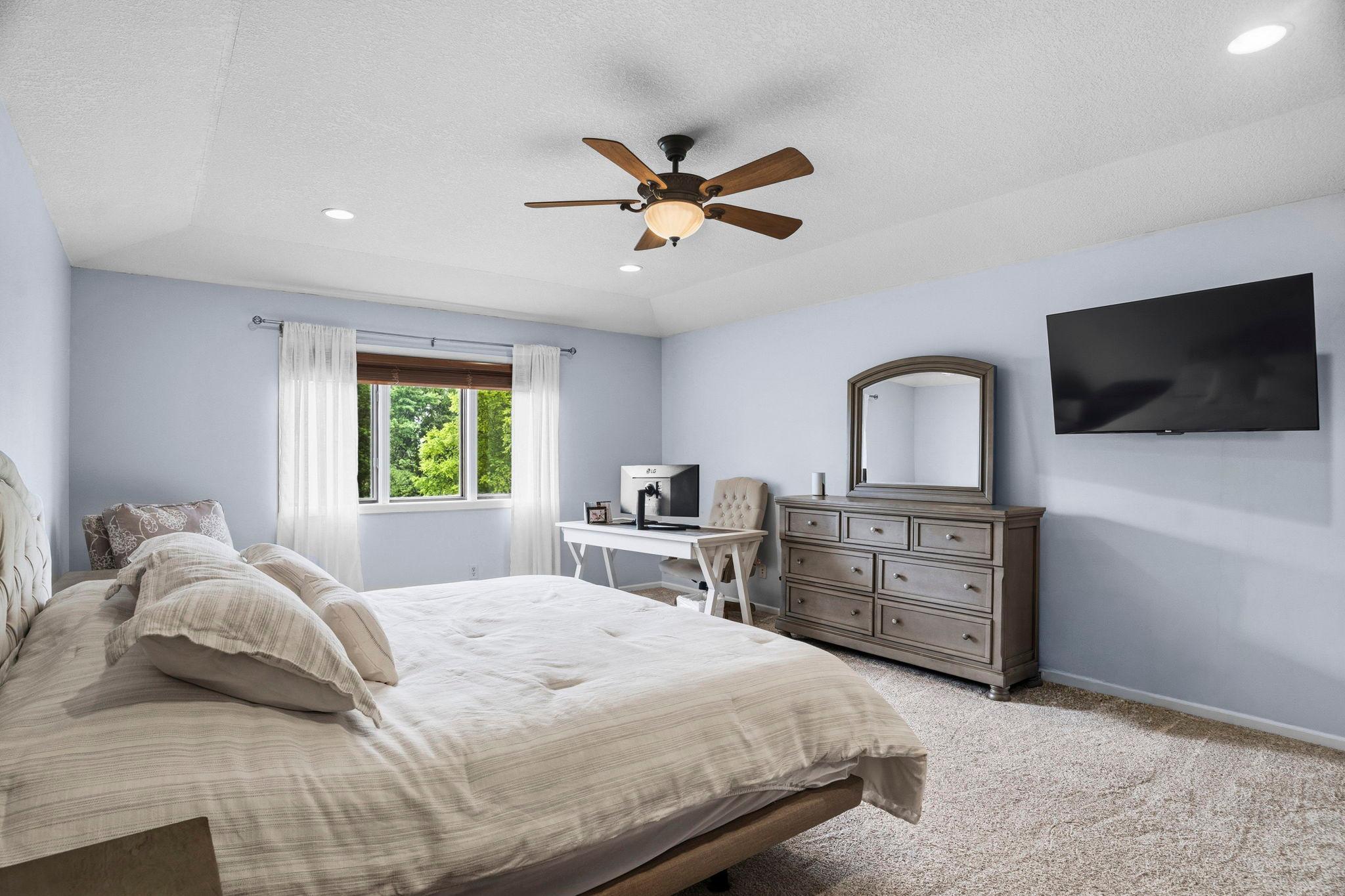 Upstairs is an elegant 20x15 owner's suite, with a pan ceiling, walk-in closet and private bathroom.