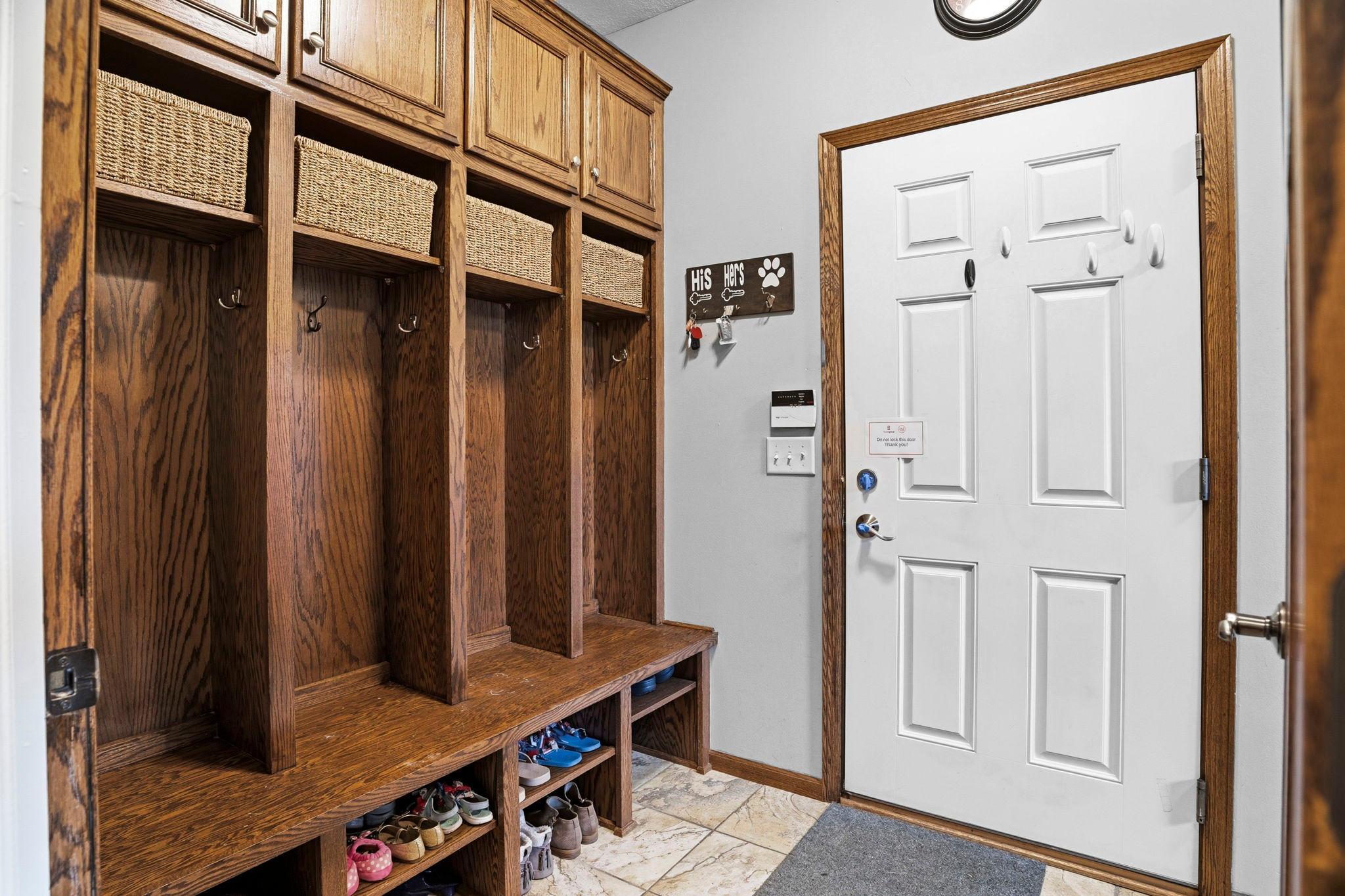 Locker storage just off the garage.