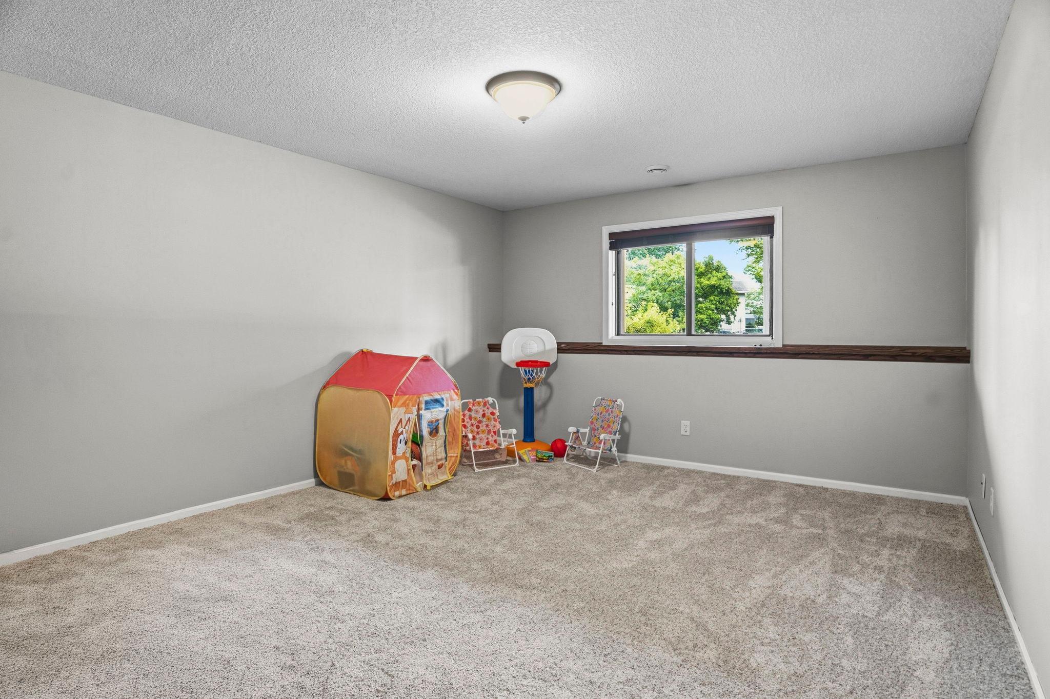The lower level also has a16x13 guest room, the nice 3/4-bathroom and a huge utility/storage room.