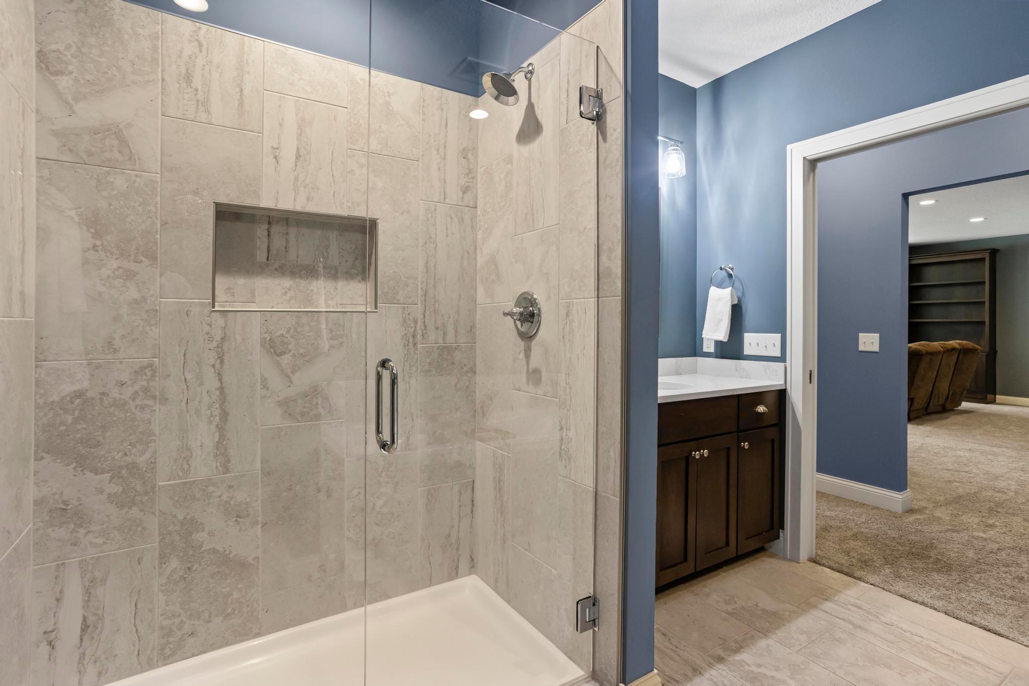 Lower-Level Walk-In Tiled Shower