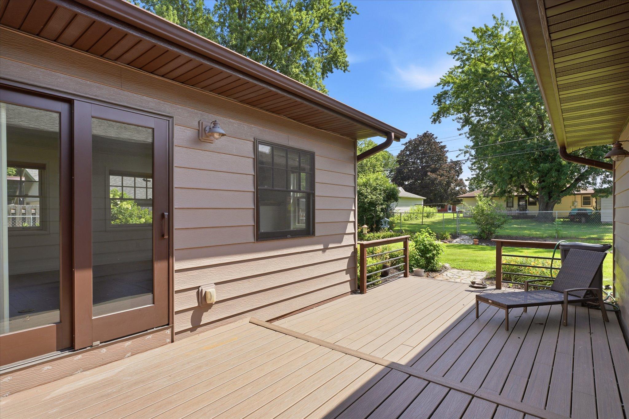Step outside to the maintenance-free patio overlooking the spacious backyard!