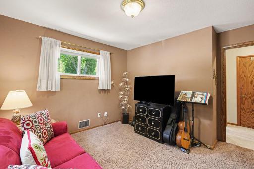 This bedroom is next to the full size bathroom.