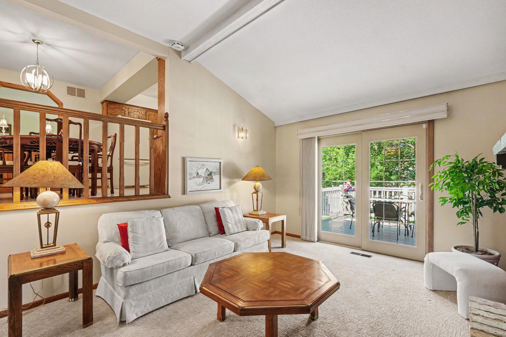 Generous room size and kitchen/dining overlooks this family room.