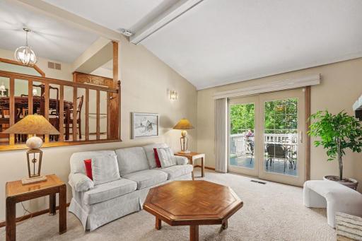 Generous room sizes and kitchen/dining overlooks this family room.