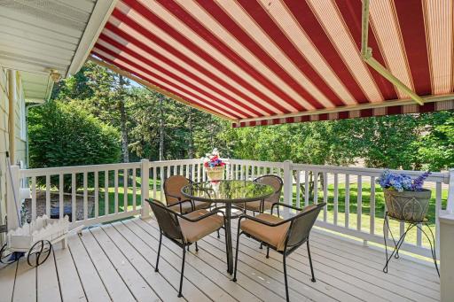 Cheery Sunsetter awning (2023) over 12x12 deck - perfect spot to relax and enjoy the backyard.