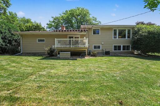 Back of home shows the big backyard!