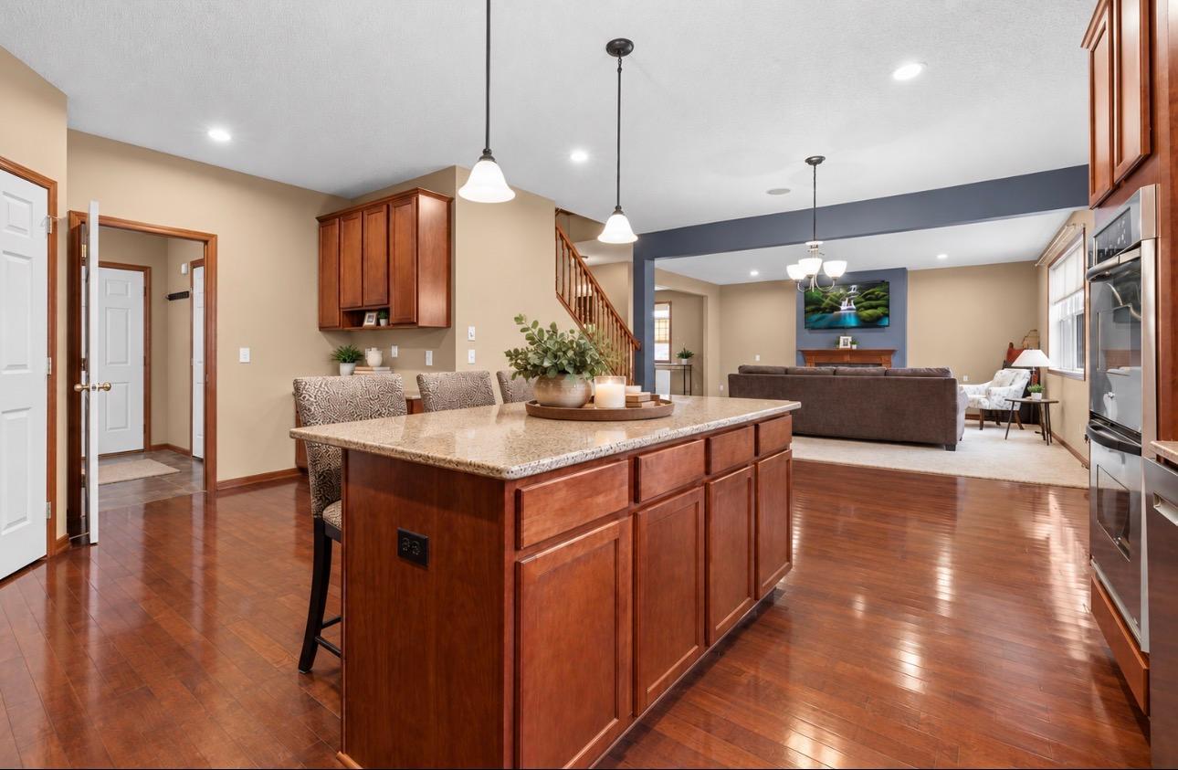 Kitchen to dine-in eating, overlooking living area