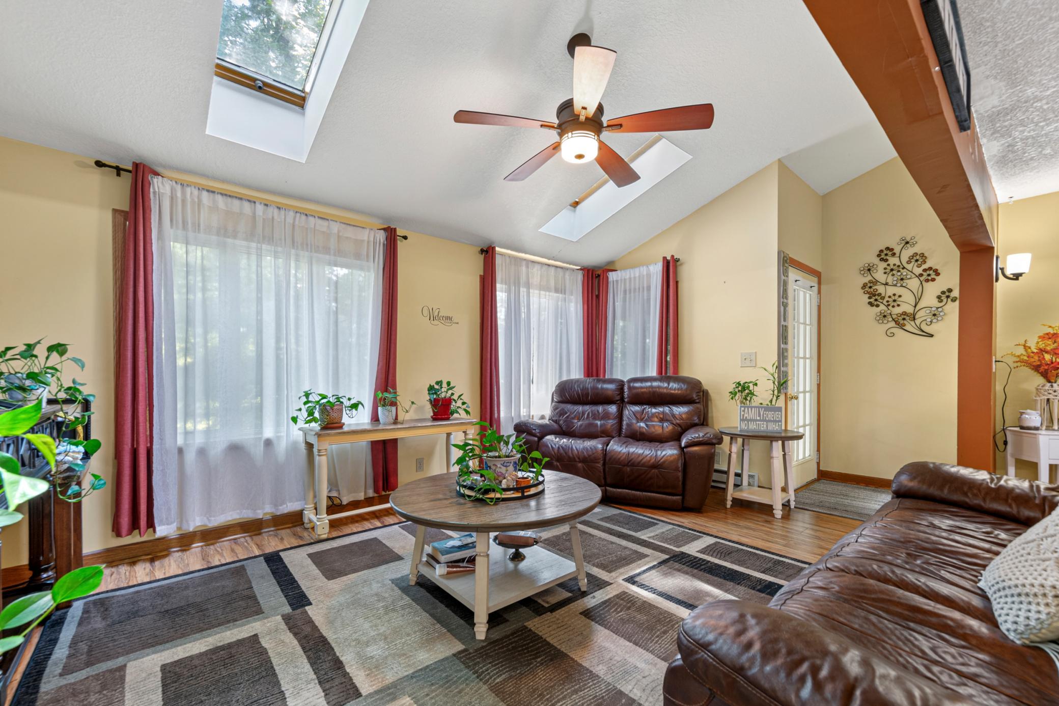 Sun room with double skylights and easy access to the backyard